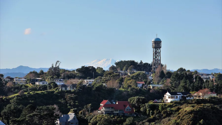 Bastia Hill Water Tower in Whanganui with Mount Ruapehu in the background