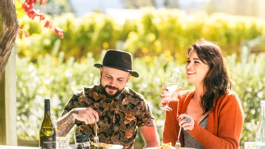 Couple dining and wine tasting at Wairau River Wines Restaurant in Renwick, Marlborough