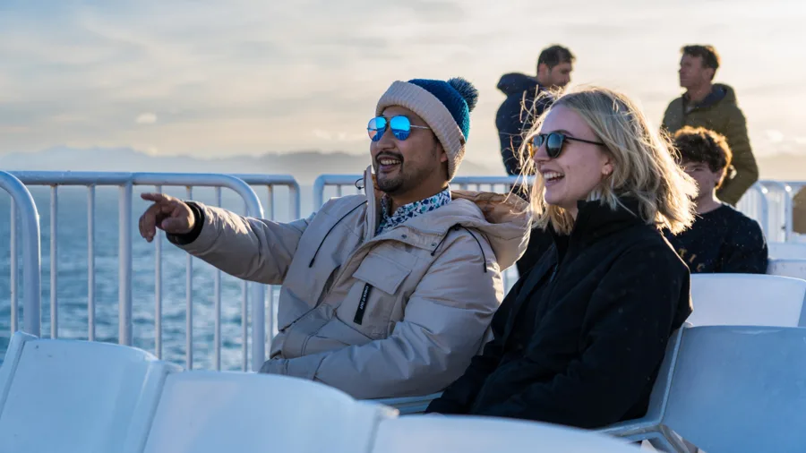 Passengers enjoying views from Interislander ferry in Marlborough Sounds
