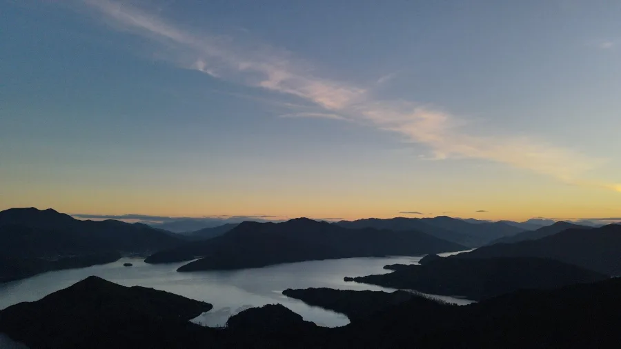 Panoramic sunset over Marlborough Sounds ridges and waterways