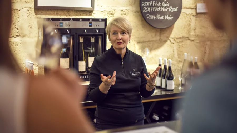 Wine expert guiding tasting at a Marlborough cellar door