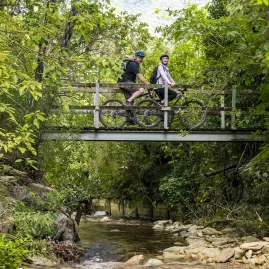 Queen Charlotte Track bikes on bridge couple MH