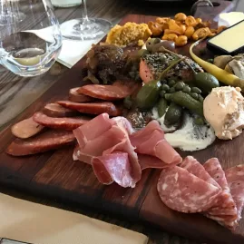 Gourmet platter with cured meats, cheeses and pickles at Saint Clair winery