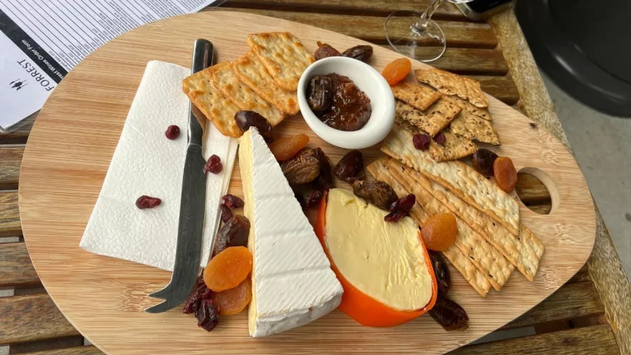 Cheese and cracker platter with dried fruits and chutney at a Marlborough winery
