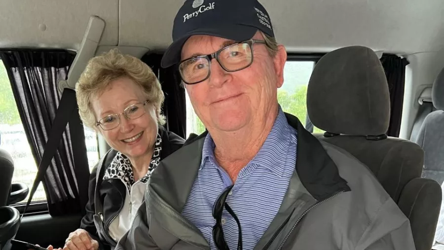 Couple enjoying Marlborough green-lipped mussels inside the tour van