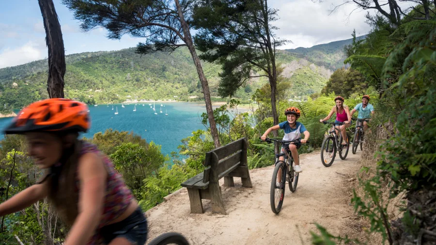 Family cycling the Ngakuta Bay link pathway near Picton, Marlborough