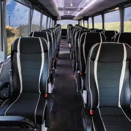 Interior view of Grand Pacific’s Signature coach showing wide, comfortable seating and panoramic windows