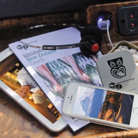 Entertainment system, travel guides, and charging ports available on the Ultimate coach