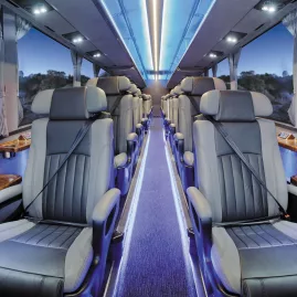 Interior of the Ultimate coach with spacious, leather-trimmed business class seats
