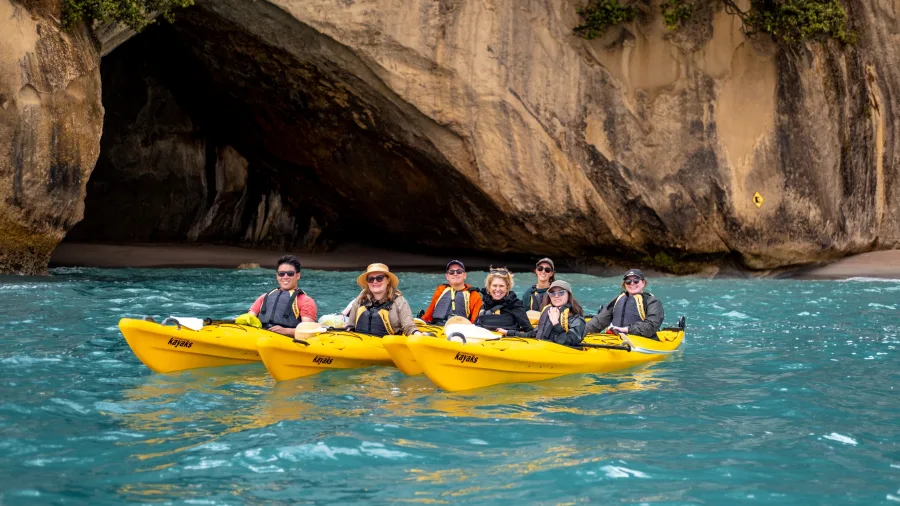 Group sea kayaking adventure at Cathedral Cove in the Coromandel