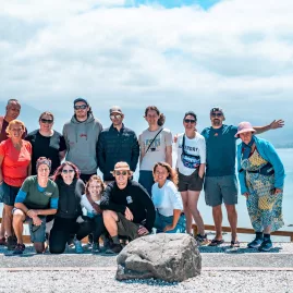 Group tour at a scenic lookout over the Kaikōura coastline