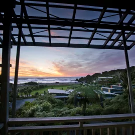 Sunset over the West Coast seen from eco accommodation at Punakaiki Resort