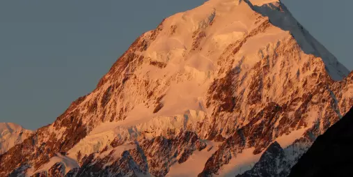 Aoraki Mount Cook summit bathed in sunset glow