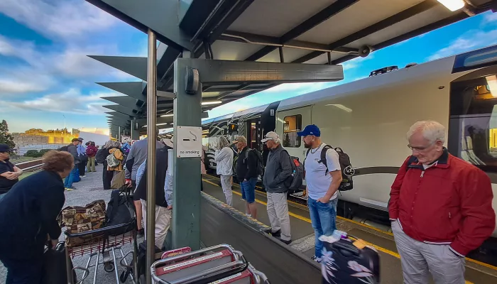 Passengers collecting luggage at Christchurch Railway Station platform