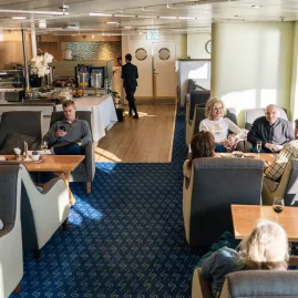 Passengers in Interislander ferry premium lounge