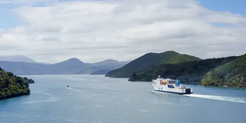 Interislander Kaitaki ferry departs Picton through Marlborough Sounds