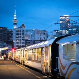 Northern Explorer train at Auckland Strand, Sky Tower
