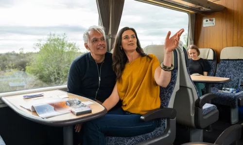 Couple enjoying scenic Northern Explorer Train