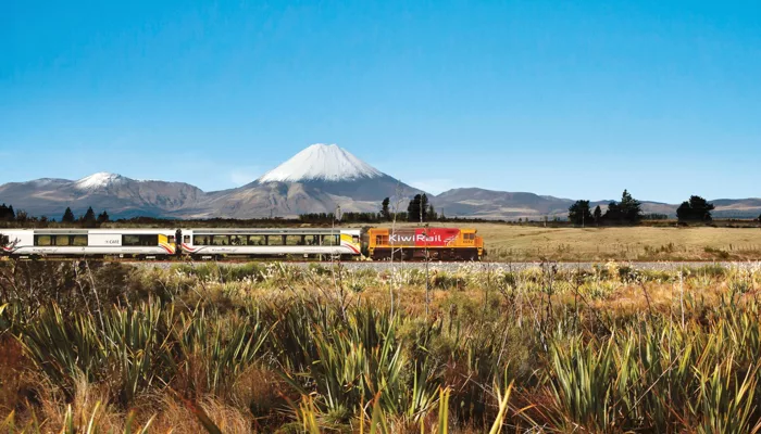 Northern Explorer Train passing a volcano in Tongariro National Park, Manawatu-Wanganui