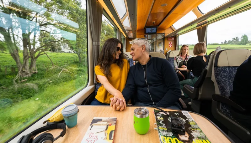 Couple enjoying scenic ride Northern Explorer Train