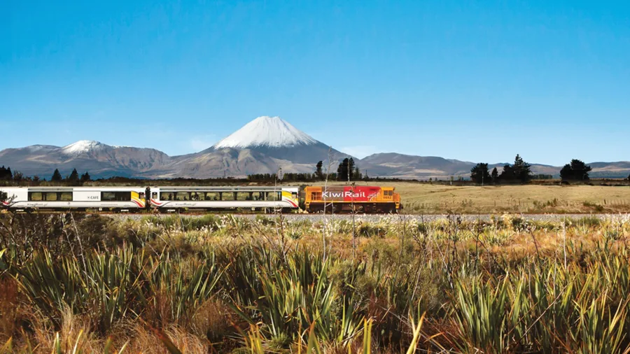 Northern Explorer Train passing a volcano in Tongariro National Park, Manawatu-Wanganui