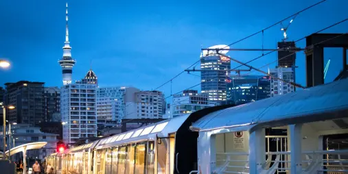 Northern Explorer train at Auckland Strand, Sky Tower