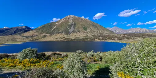 Alpine lake and mountain near TranzAlpine route