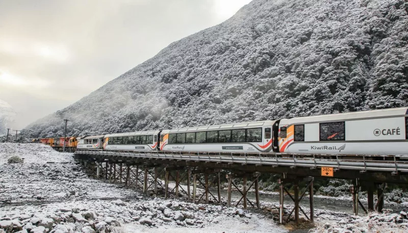 TranzAlpine train travelling through snow-covered Arthur’s Pass