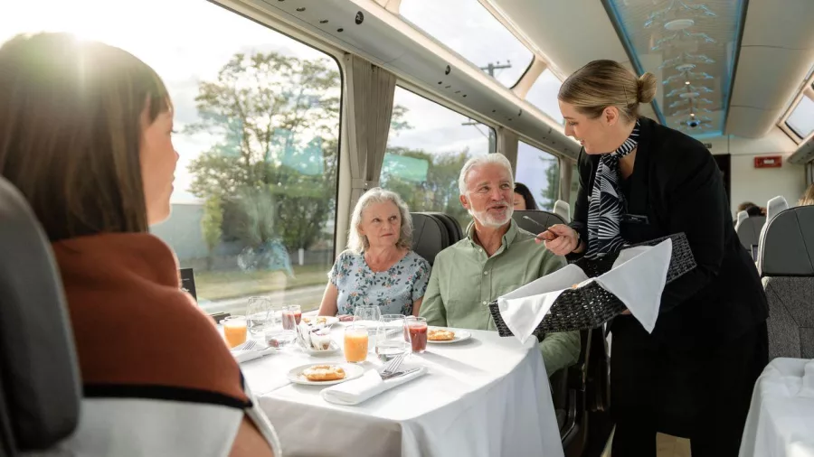Breakfast service in Scenic Plus carriage on TranzAlpine train