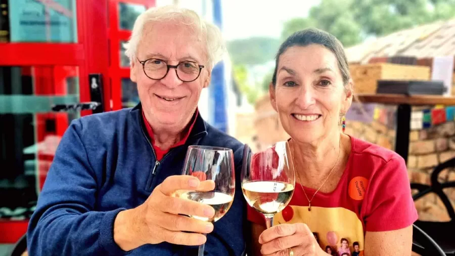 Couple enjoying white wine at an outdoor venue in Whangārei, Northland