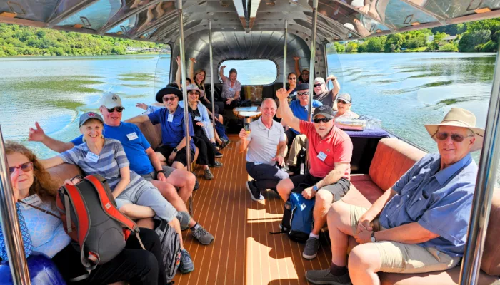 MoaTrek tour group enjoying a boat cruise on Lake Rotoiti, Rotorua