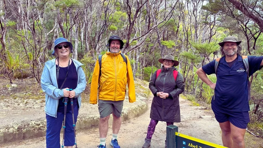 Guided group hike on the Abel Tasman Coast Track
