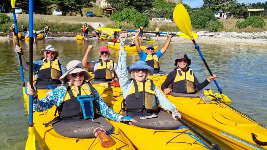 Happy guests kayaking on Kaikōura eco tour