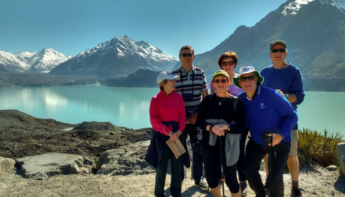 Moatrek travellers enjoying views of Tasman Glacier lake on a clear day