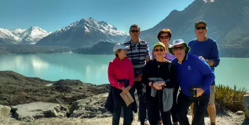 Moatrek travellers enjoying views of Tasman Glacier lake on a clear day