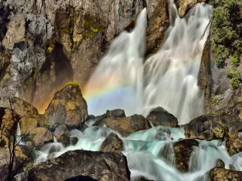 Tarawera Falls waterfall emerging from cliff face in Bay of Plenty, New Zealand