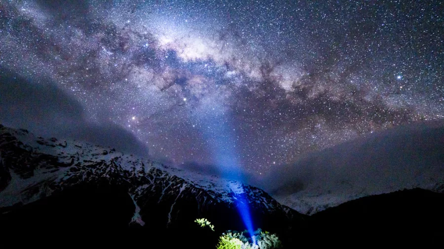 Beam of light into Milky Way in Aoraki Mackenzie Dark Sky Reserve