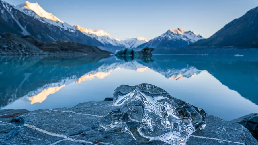 Clear ice fragment on the shore of Tasman Lake, Aoraki Mount Cook National Park