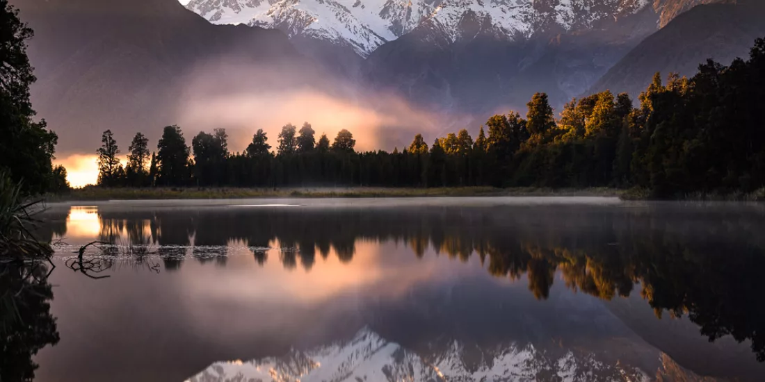 Lake Matheson reflecting Mount Cook and Mount Tasman on West Coast South Island