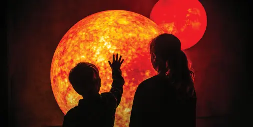 Children engage with solar system exhibit at Dark Sky Experience in Tekapo