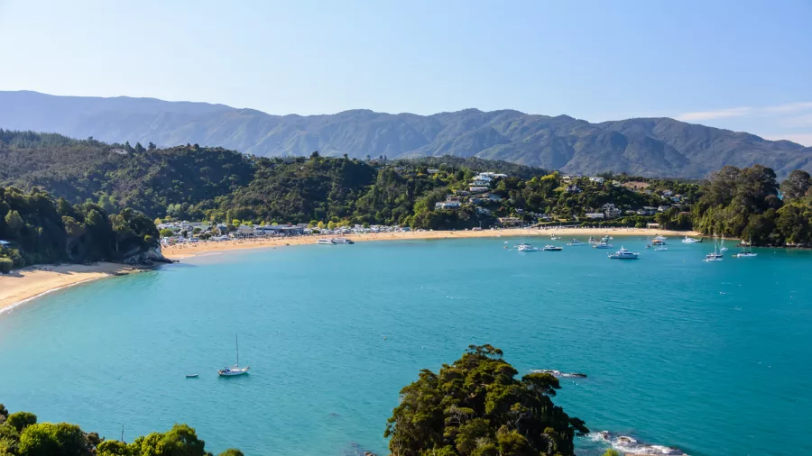 Scenic view of Kaiteriteri Beach and boats from Stephens Bay Walk lookout