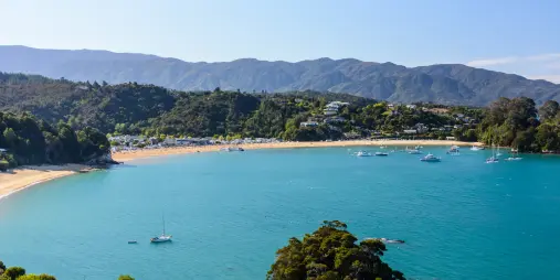 Scenic view of Kaiteriteri Beach and boats from Stephens Bay Walk lookout