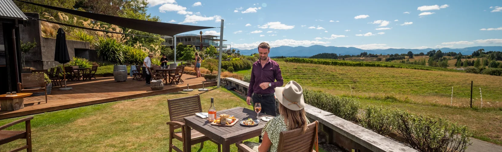Outdoor vineyard lunch setting at Gravity Winery in Upper Moutere