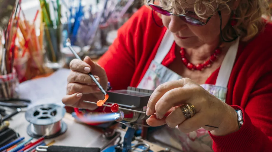Glass artist creating handcrafted jewellery in Takaka