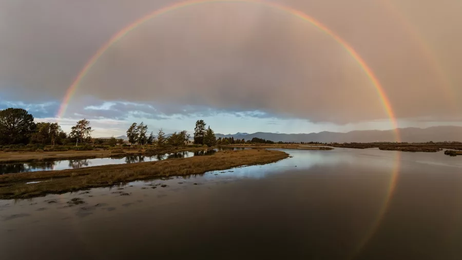 Full rainbow over wetlands on the Great Taste Trail, Ruby Coast, Nelson Tasman
