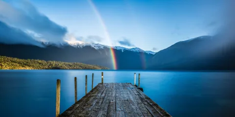 Rainbow over Lake Rotoiti jetty in Nelson Lakes National Park
