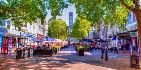 Trafalgar Street in Nelson New Zealand with outdoor dining and shops