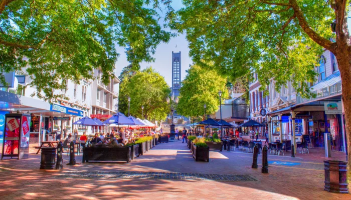 Trafalgar Street in Nelson New Zealand with outdoor dining and shops