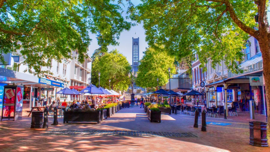 Trafalgar Street in Nelson New Zealand with outdoor dining and shops