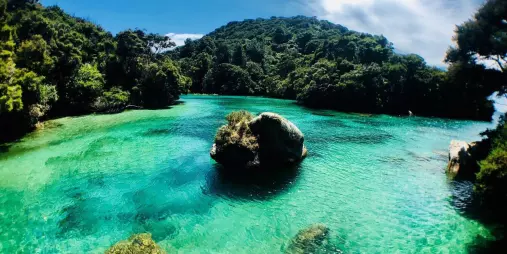 Crystal-clear waters at Shag Harbour between Awaroa and Onetahuti on the Abel Tasman Track